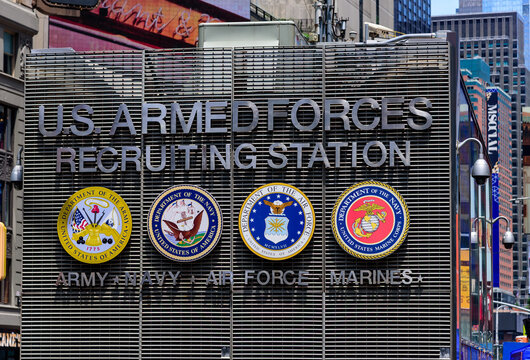 New York City, New York, USA, June 14, 2026: The iconic US Armed Forces Recruiting Station stands amidst the bustling crowds and commercial billboards of Times Square in Midtown Manhattan.