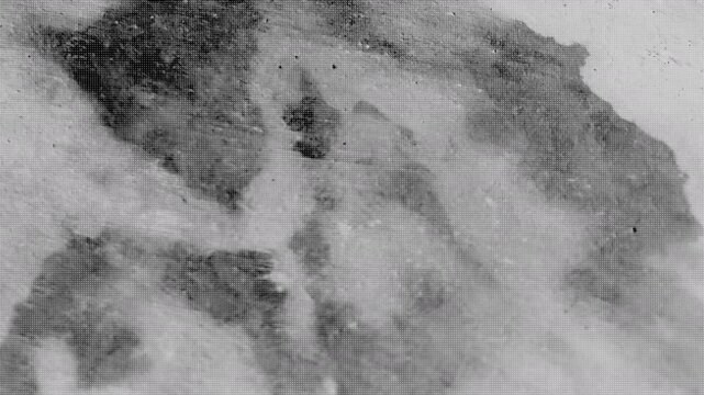 Halftone dots grunge overlay texture distressed vintage film grain for adding an aged cinematic look to video projects and creative motion graphics.