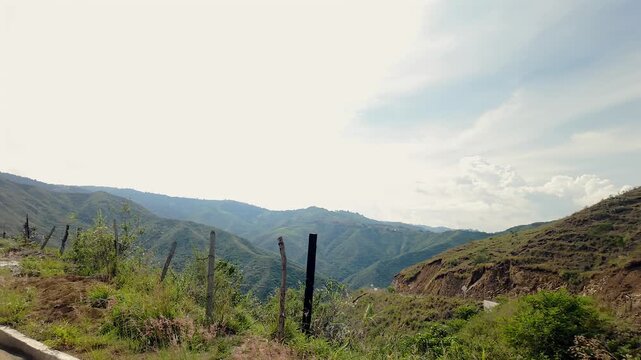 driving along scenic winding mountain road in yotoco valle del cauca colombia