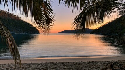 Obraz premium Serene cove at twilight, framed by palm fronds, calm waters glow warm