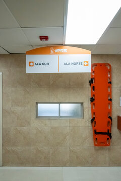 Directional Signage and Emergency Stretcher in IESS Hospital Corridor