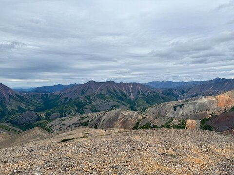 Expansive mountain landscape with dramatic peaks, valleys, and alpine terrain un