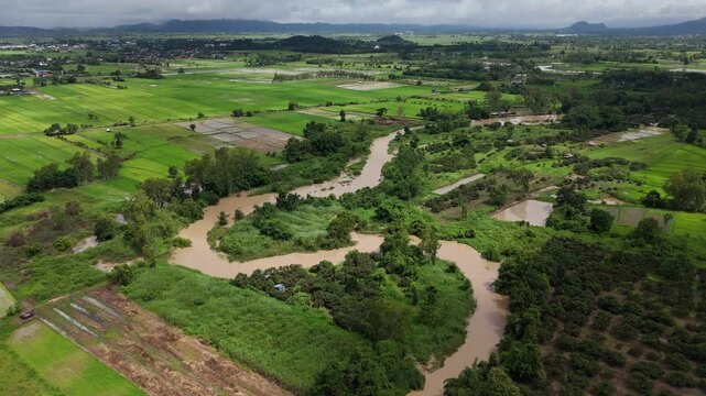 Scenery view of the nature and agriculture field in Pa Daet district in Chiang Rai province of Thailand during rainy season.