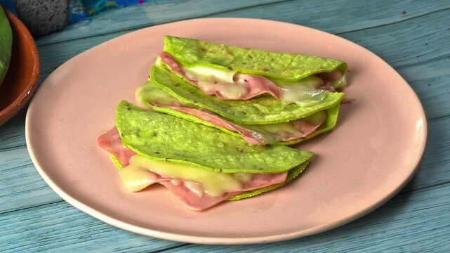 Mexican green cactus tortillas with melted cheese and fresh nopales