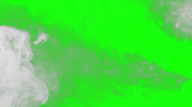 Smoke plumes drift across the frame in a continuous motion pattern against a bright green background.