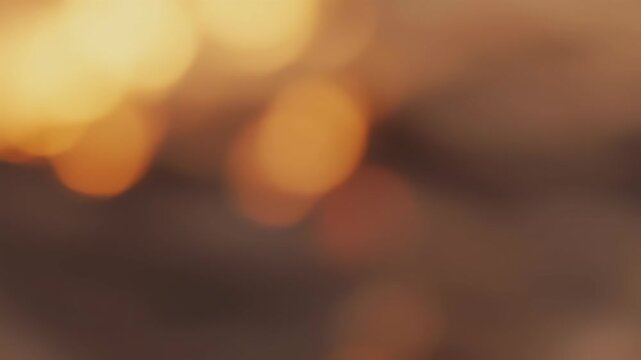 Blurry orange and brown background texture.