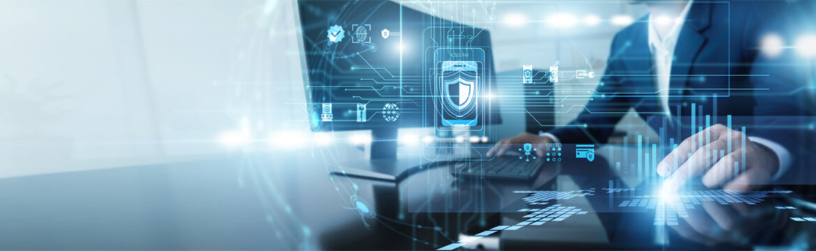 Security expert working on computer on mobile security. Specialist developing advanced encryption and threat detection systems to protect smartphones and tablets from cyber attacks today.