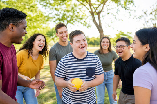 Diverse Group of Friends with Down Syndrome Outdoors - Friendship, Social Inclusion &
Youthful Joy