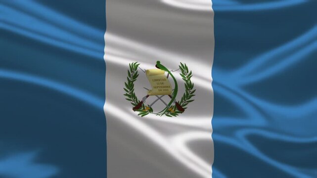 Waving flag of Guatemala with national coat of arms on a blue and white background. High quality 3D animation of the Guatemalan national flag fluttering in the wind with satin texture.