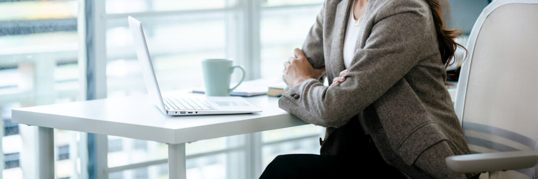 Professional woman focusing on important document at office work environment