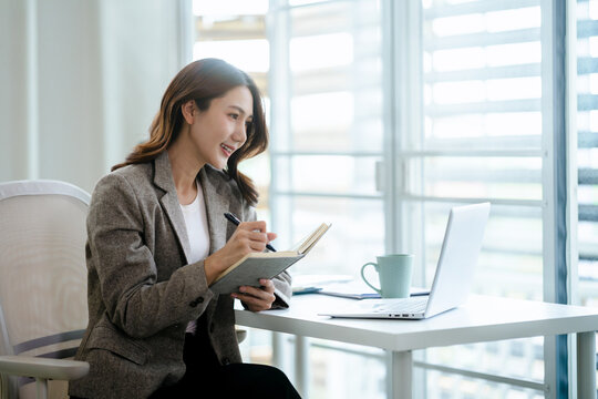 Professional woman focusing on important document at office work environment