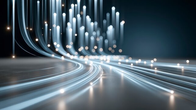 Abstract digital art of flowing light trails and glowing orbs creating a futuristic, dynamic motion effect on a dark background.