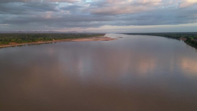 Aerial view landscape of the Mekong river in Nakhon Panom, Thailand.Scene of residential development, waterway transport, and agricultural economy in Thailand.