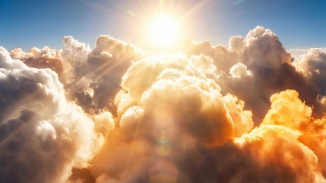 Low angle timelapse sun on blue sky concept. Sunlight shining through dramatic golden clouds in a bright blue sky at sunrise or sunset