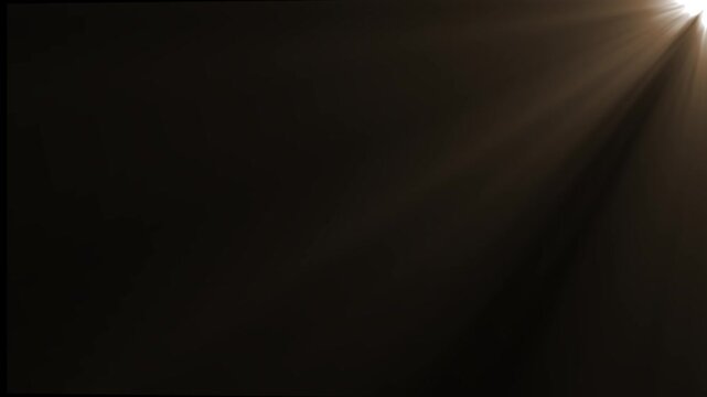 Warm golden sunbeams and vintage light rays illuminating from top right corner on black background for cinematic overlay.