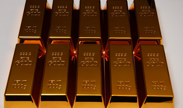 Gold bar in investment. Gold bar studio background. Gold reserve bullion bars. Metal gold texture.