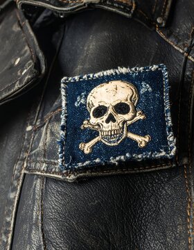 Skull and Crossbones Patch on Leather Jacket.