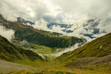 Fototapeta premium Col de Tricot, France - 10.09.2025: Dramatic View of the Alpine Valley