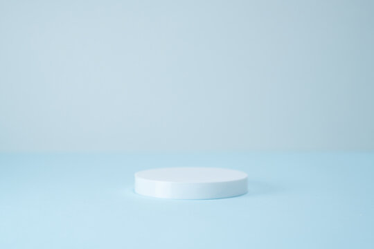 Minimalist Round Product Display Podium on Light Blue Background