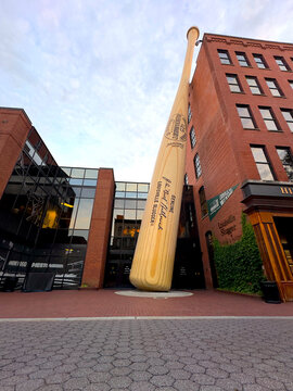 The Big Bat outside Louisville Slugger Museum & Factory in downtown Louisville Kentucky on a cloudy day. Louisville KY, USA. June 18, 2026.