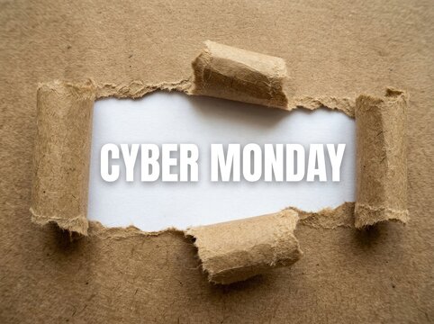 Ripped Paper Revealing Cyber Monday Text, Sales and Discount Concept