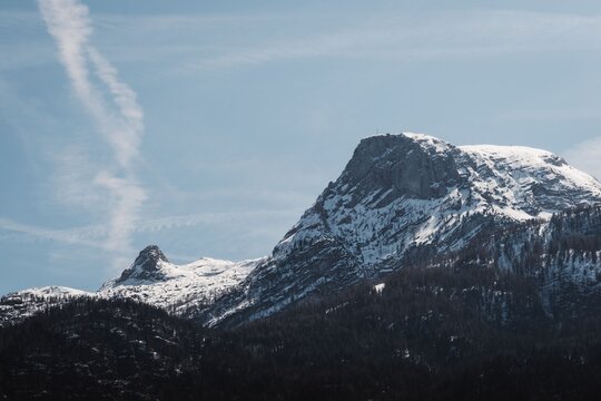 Snowy mountain peak landscape. Winter mountain scenery with snow capped hills.