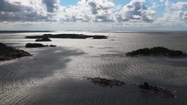 Aerial view of clouds moving over rocky islands in Kopparn&auml;s archipelago, Finland