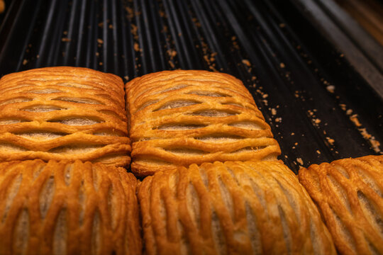 fresh apple strudel pastries in bakery display case