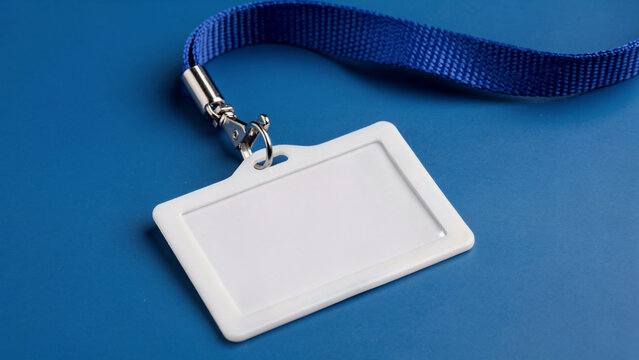 Blank white identification badge with blue lanyard, close-up, perfect for corporate events, security access and visitor passes