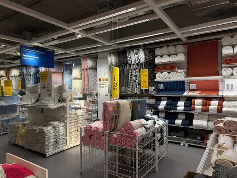 Mallorca, spain, july 09, 2026, ikea store displaying bedding textiles, home furnishings, and blankets, creating a retail shopping experience for customers