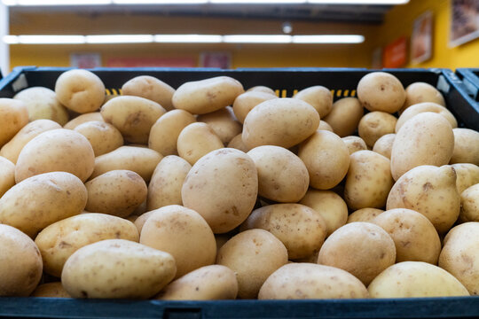 Stand of potatoes in a supermarket