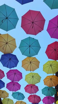 colorful umbrellas on the beach street