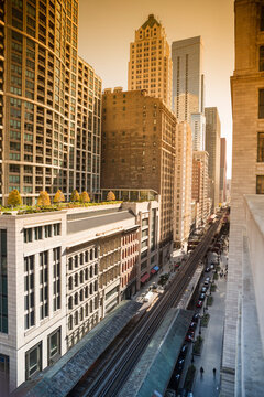 High angle view of Chicago urban street and El train tracks