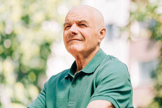 Thoughtful senior man enjoying the outdoors