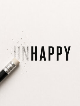 Eraser Removing Un from Unhappy Word to Reveal Happy Concept, Removing Negative Prefix, Psychological Change, Personal Development