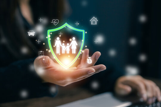 Family insurance protection concept with glowing shield icon, health, home, vehicle and financial security symbols. Businesswoman presenting comprehensive coverage, safety, risk management solutions.