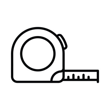 A tape measure sits on a surface with markings visible.