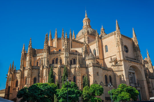Exterior of Catedral de Segovia (Segovia Cathedral) in Segovia, Spain against a cloudless sky