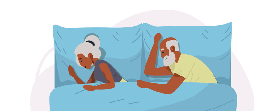 Senior couple in bed relationship problems man and woman lying back to back on blue pillows and blanket emotional distance home bedroom