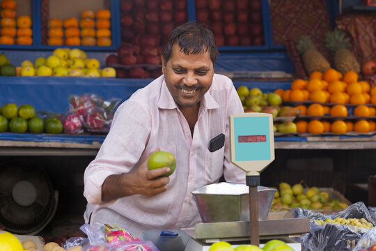 Fruit vendour Selling Fruits at the Market