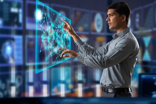 Digitally enhanced shot of a  technician/businessman working with virtual reality projection