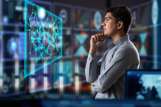 Digitally enhanced shot of a  businessman working in the office superimposed over multiple lines of computer