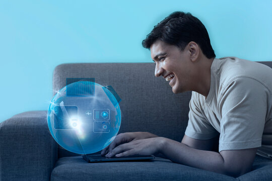 Man uses laptop on virtual visual screen