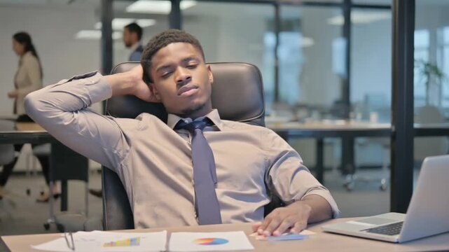 Very tired worker in the office.