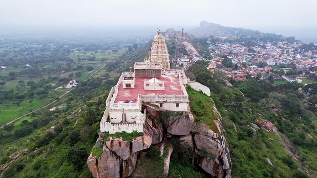 Drone view of Melkote temple nestled amidst scenic hills and countryside beauty