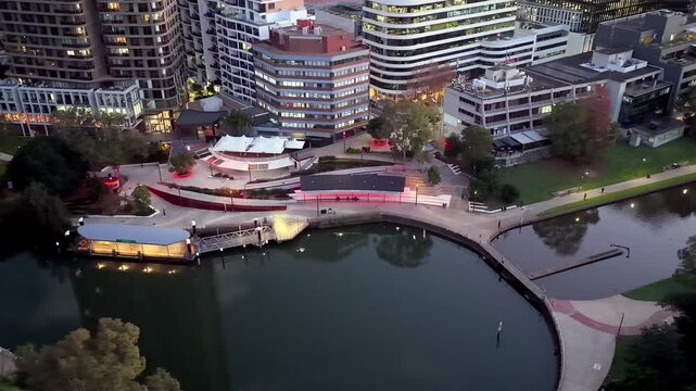 Parramatta river waterfront CBD high-rise towers architecture in Sydney at sunset.