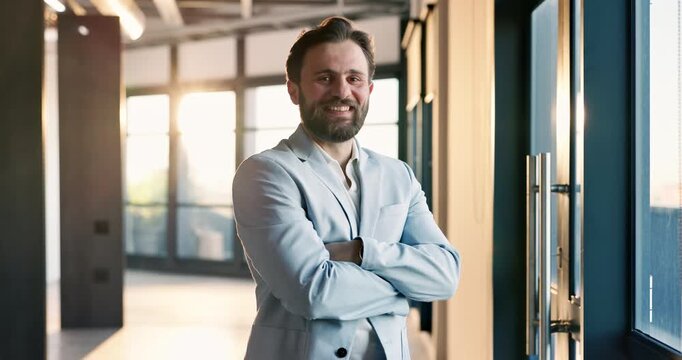 Pride, face and realtor in office with arms crossed, property investor and ambition as real estate consultant. Happy, man and broker with confidence, listing agent and about us in housing industry.