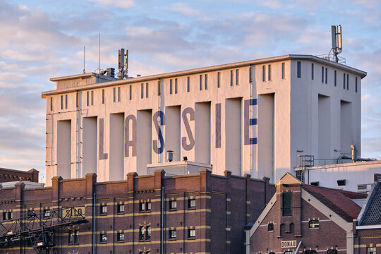 Lassie rice factory industrial heritage building in Wormer Netherlands with historic architecture and urban landscape at sunset cityscape