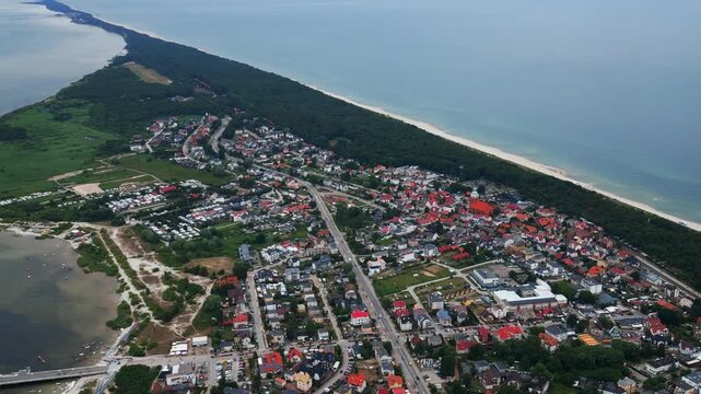 cloudy summer day at Jastarnia town, Poland, Hel peninsula, aerial drone view 4k