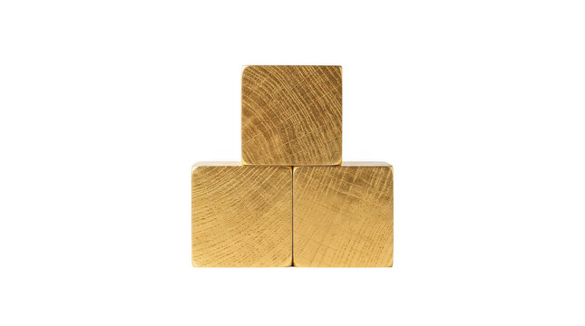 Three wooden cubes with gold leaf finish arranged in a pyramid shape isolated on transparent background